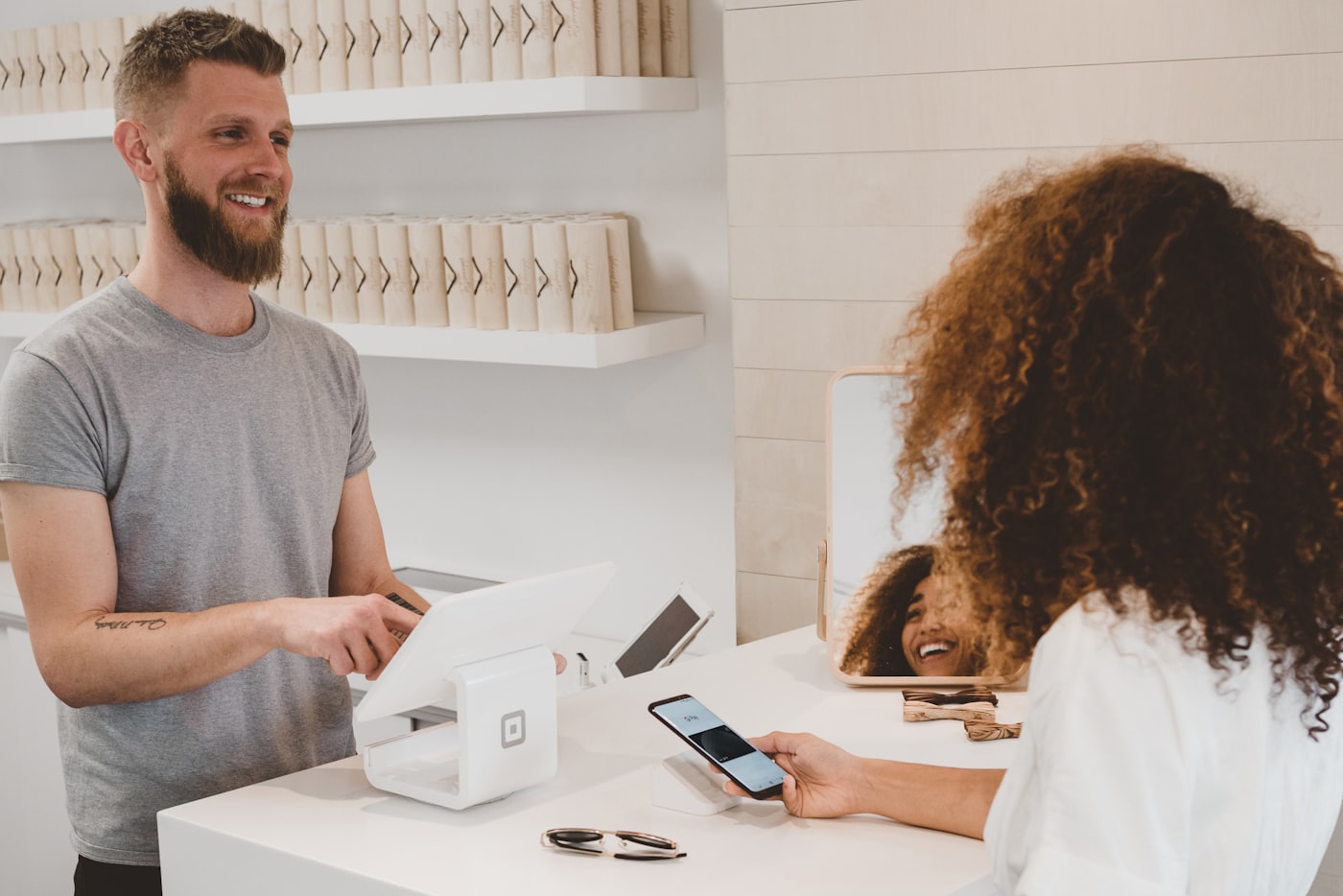 Modern retail checkout scene representing commercial ecommerce creative systems beyond single AI images